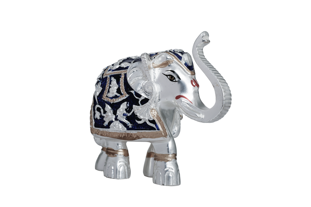 Silver elephant with blue drape